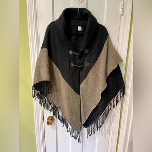 Fringed shawl-collared poncho with toggle buttons, OS